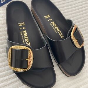 Birkenstock Black Slides with Gold Accents